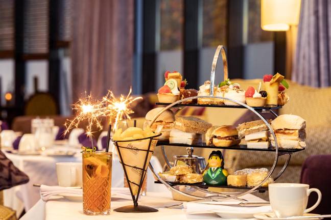 The afternoon tea includes Derry sausage roll baps, cream horns, cones of chips and Tayto crisp sandwiches (Credit: Hastings Everglades Hotel)