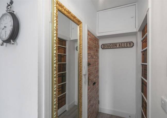 It has secret storage space disguised by a long Hogwarts-esque mirror (Credit: Jam Press)