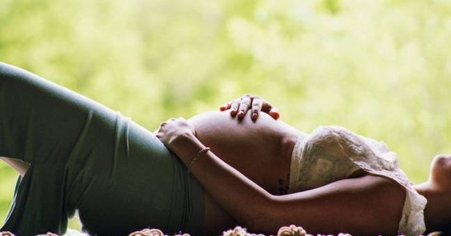 The TikTok mum's baby belly looks totally different when she lies down. (Credit: Pexels)