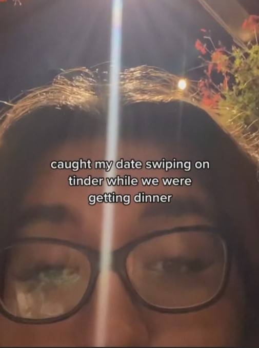 TikTok user @totallykri caught her date on Tinder during their meal. Credit: TikTok/totallykri