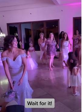 The bride made out like she was going to throw the bouquet (Credit: TikTok/ @lauragr37)