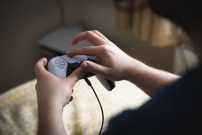 The 10-year-old's cousins enjoy playing with his PS5. Credit: Alamy.