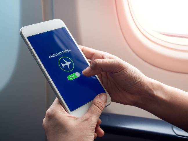 Passengers are always told to put their devices on flight mode. Credit: Alamy / Techa Tungateja