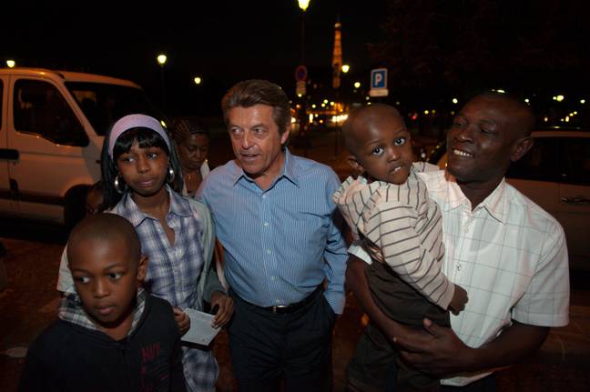 Bakari, her family and Alain Joyandet, minister of state in France. Credit: Alamy