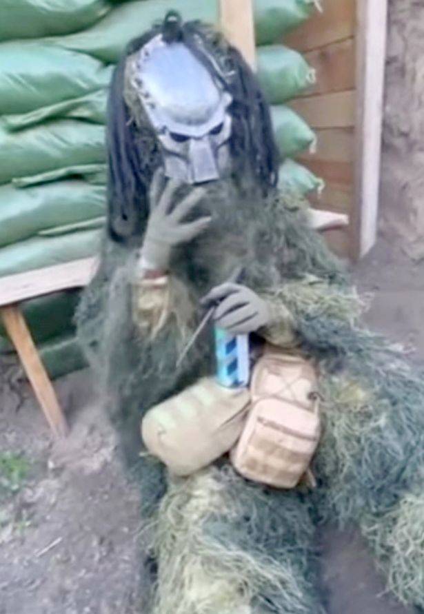 The Ukrainian sniper has become known for his costume. Credit: Voices for Ukraine/YouTube