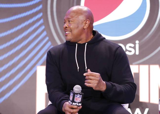Dr Dre sits down for Super Bowl halftime show press conference. (Alamy) 