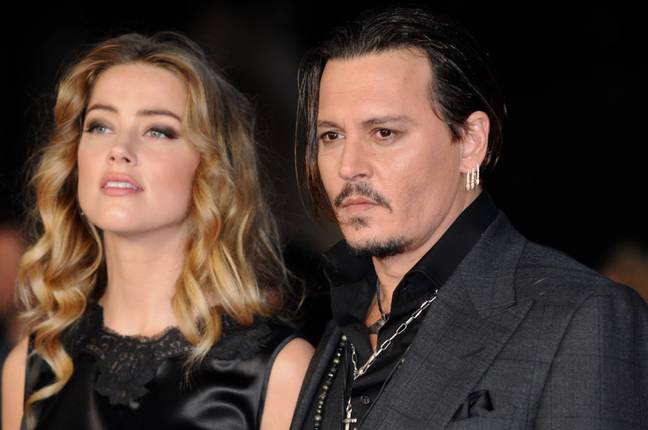 Johnny Depp and Amber Heard at the BFI London Film Festival for 'Black Mass'. Credit: Alamy