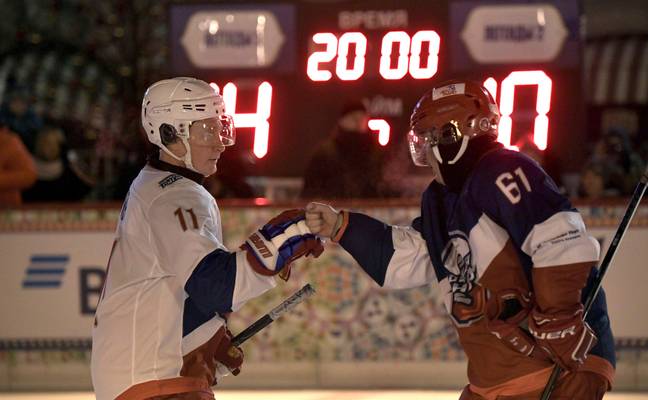 Putin and Potanin during an ice hockey tournament. Credit: Alamy