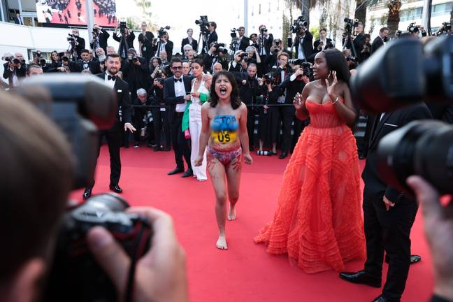 She stormed the red carpet before being removed by security. Credit: Getty Images