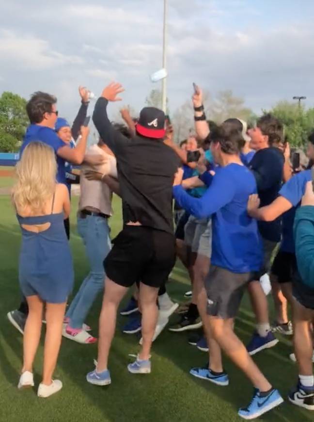 Hannah can be seen being pushed out of the way as her boyfriend celebrates with his mates. Credit: TikTok/@hannah.j.c16