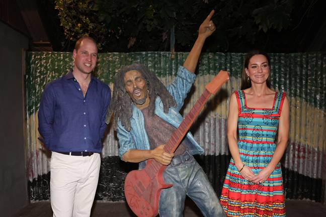 The Duke and Duchess of Cambridge posing next to a cut-out of Bob Marley on their week-long tour in celebration of the Queen's Diamond Jubilee. Credit: Alamy