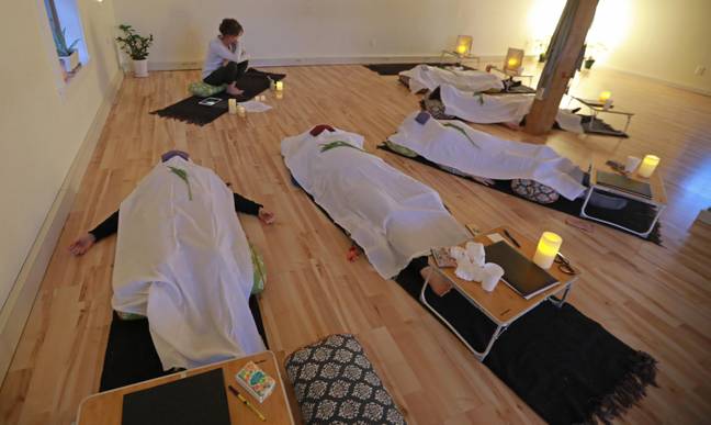 Death doula guides participants through 'living funeral' (Alamy)