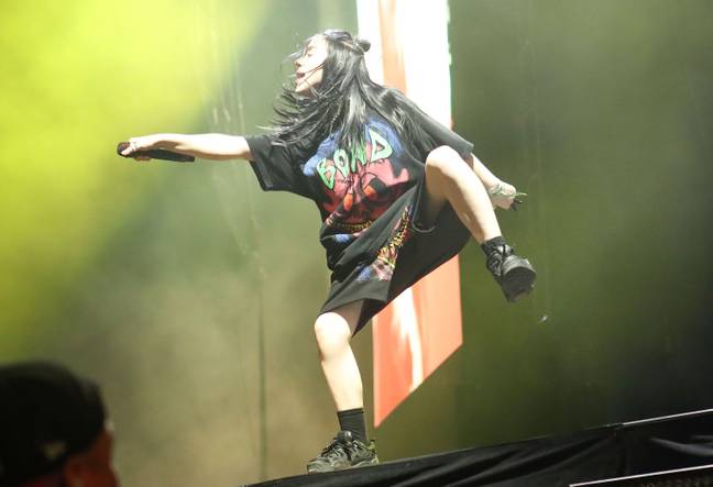 Billie Eilish has admitted using a body double on stage at Coachella with the help of one of her dancers and a disguise. Credit: Alamy