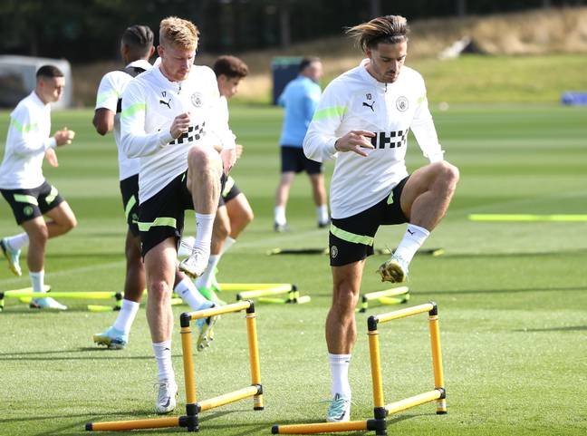 Jack Grealish and Kevin De Bruyne are put through their paces. (PA Images / Alamy)