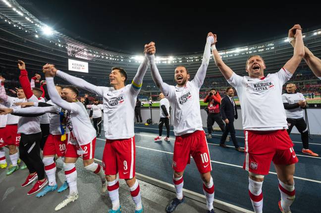 Poland players celebrate getting to the World Cup. Image: Alamy