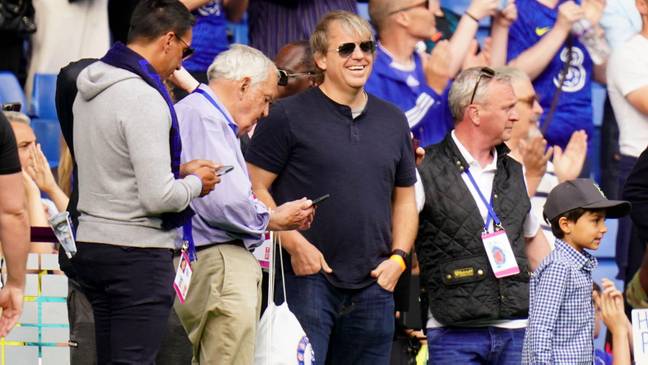 Chelsea owner Todd Boehly (centre) at the side of the pitch after the Premier League match at Stamford Bridge. (Alamy)