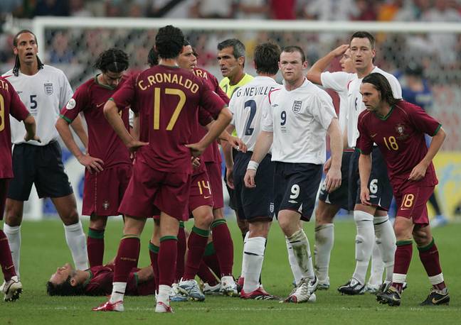 Rooney and Ronaldo share words after the sending off. Image: PA Images