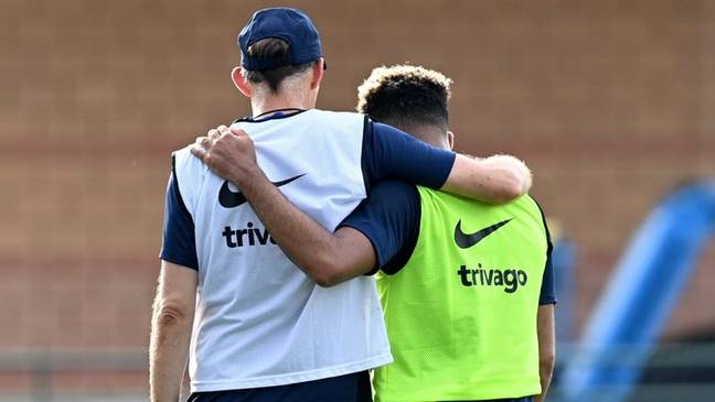 Thomas Tuchel and Reece James embracing each other during Chelsea training. (Chelsea FC)