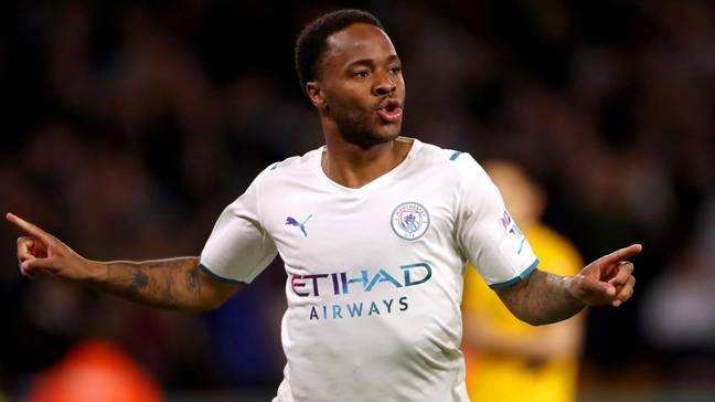 Manchester City's Raheem Sterling celebrates scoring a goal shortly before it is disallowed for offside during the Premier League match at the Molineux Stadium. (Alamy)