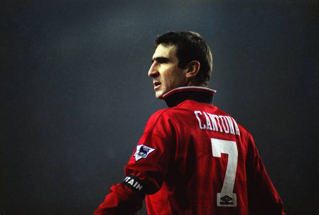 Eric Cantona of Manchester United with his collar popped against Tottenham Hotspur at White Hart Lane in January 1996 (Alamy)