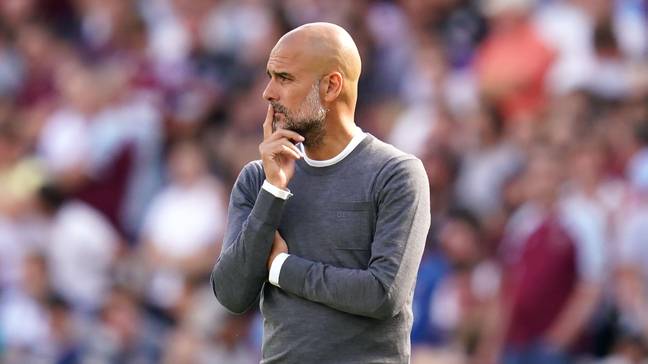 Pep Guardiola looks on in Manchester City's 0-2 win against West Ham.
