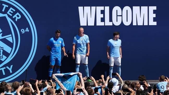 Erling Haaland, Stefan Ortega, and Julian Alvarez meet Manchester City fans.  Sportimage / Alamy
