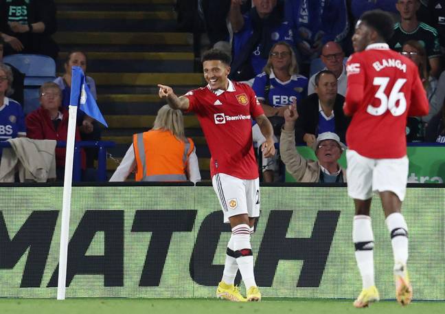 Jadon Sancho celebrates scoring against Leicester City. (Alamy)