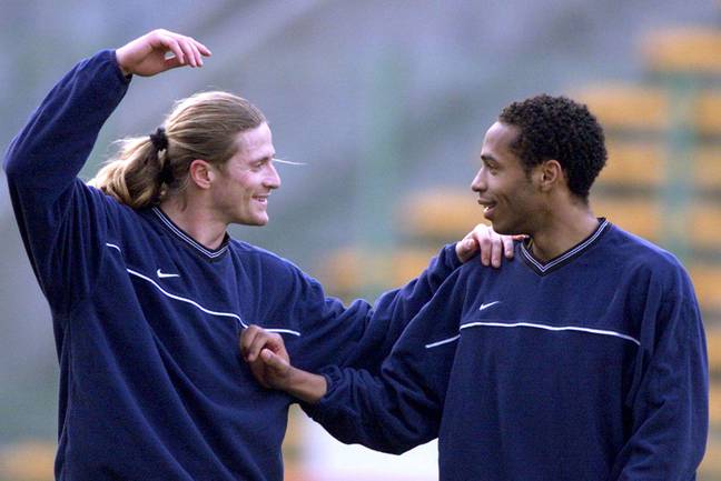 Petit and Henry played alongside each other for Arsenal and France (Image: PA)