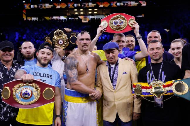 Usyk with all his belts. Image: Alamy