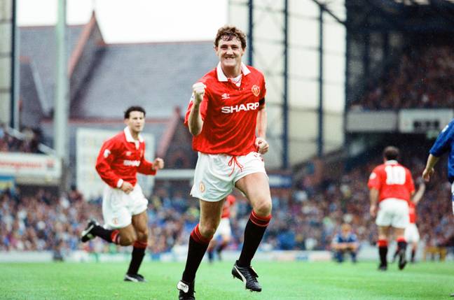 Steve Bruce celebrates after scoring in a 2-0 win against Everton in September 1992 (Alamy)