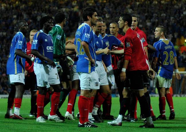 Ronaldo and Hughes argue before the red card is shown. Image: PA Images