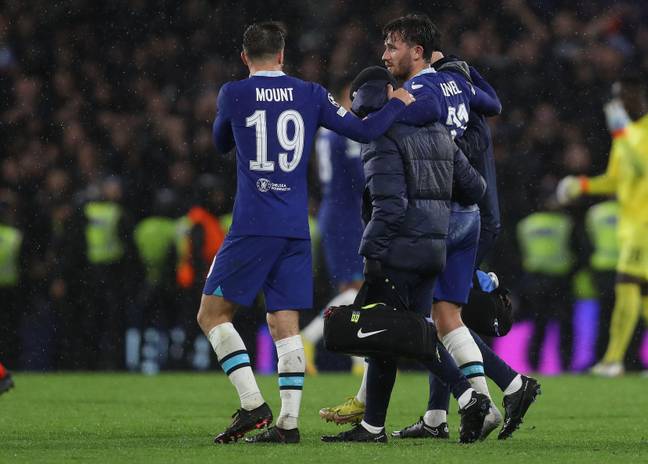 Ben Chilwell of Chelsea is helped across the pitch after the game after he picks up an injury. (Alamy)