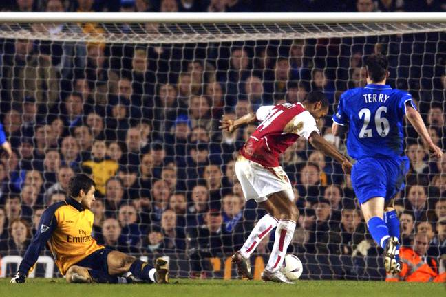 Henry scores against Cudicini. Image: PA Images