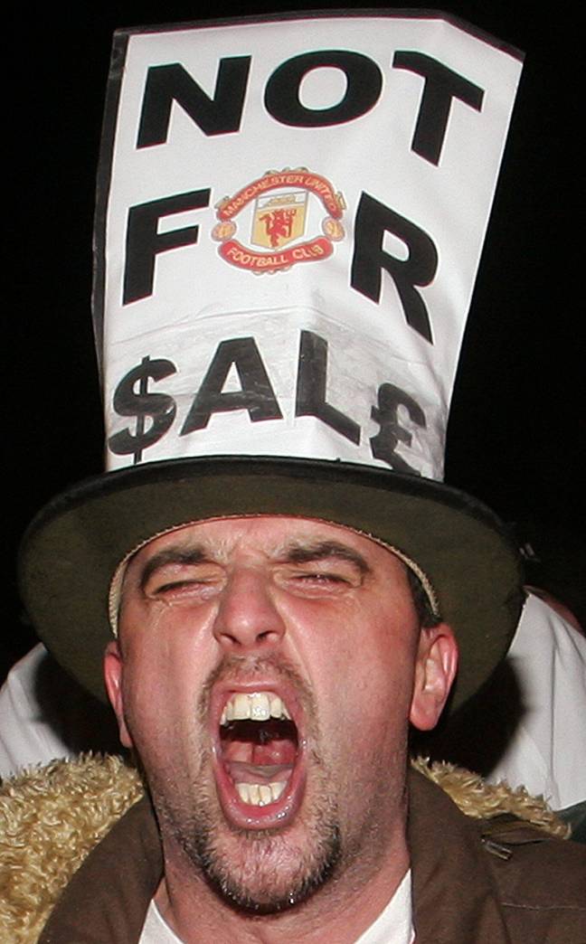 A fan protesting against the proposed Glazer takeover in February 2005. (Alamy)