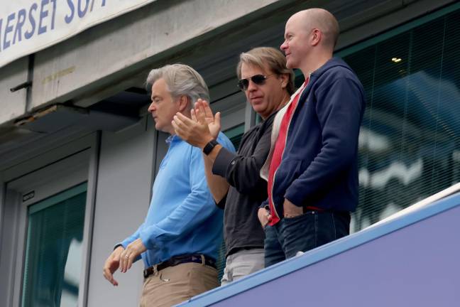 Boehly, middle, enjoys his first game at Stamford Bridge. Image: PA Images