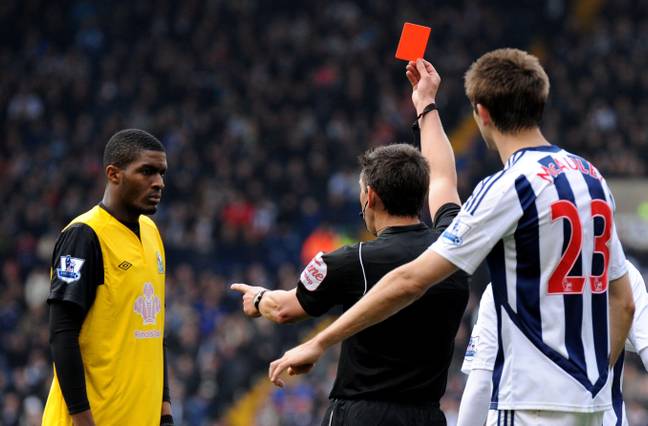 Modeste is sent off after kicking out at Billy Jones. (Image Credit: Alamy)