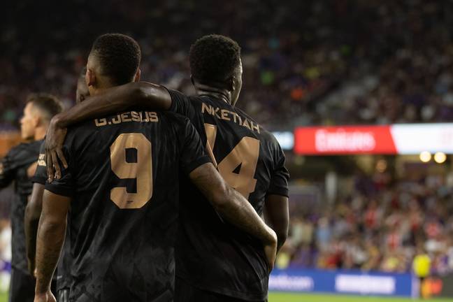 Eddie Nketiah celebrating with Gabriel Jesus after his goal.