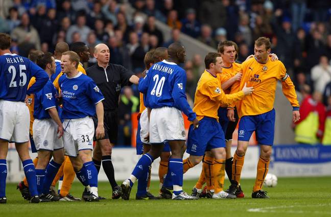 Ferguson trying to be calmed down by his Everton teammates. (Credit: Alamy)