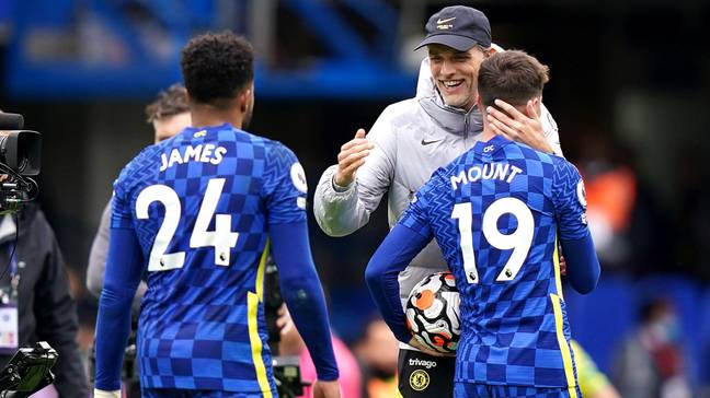 Chelsea manager Thomas Tuchel (centre) celebrates with Mason Mount (right) after the final whistle in the Premier League match (Image: Alamy)