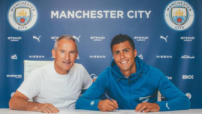 Rodri and Txiki Begiristain signing new contract (Image: Manchester City)