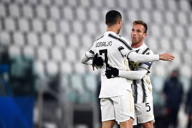 Arthur checking Ronaldo's waistline so he can decide if he wants to join in his diet. Image: PA Images