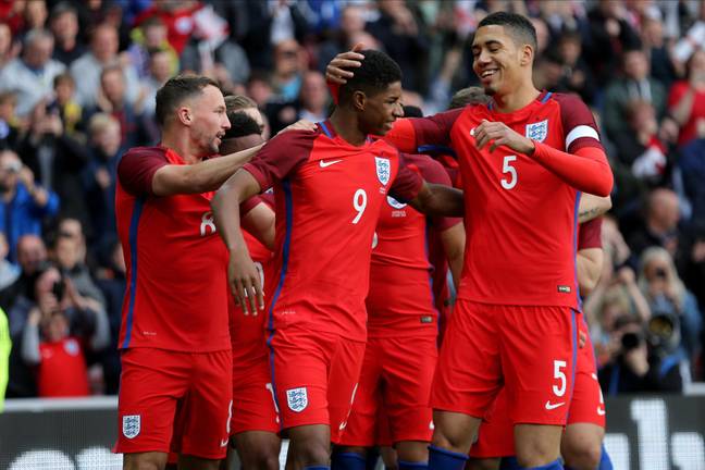 Marcus Rashford celebrating after scoring on his England debut in 2016. Image Credit: Alamy