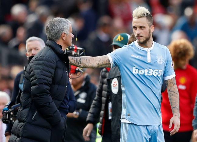 Arnautovic and Mourinho embrace during their times at Stoke City and Manchester United. (Credit: Alamy)