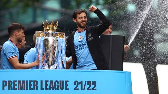Bernardo Silva celebrates Manchester City's Premier League trophy success.
