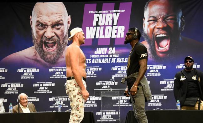 Fury and Wilder face off at the press conference. Image: PA Images