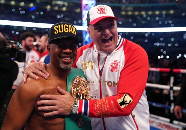 SugarHill Steward and John Fury celebrate Tyson's win. Image: PA Images