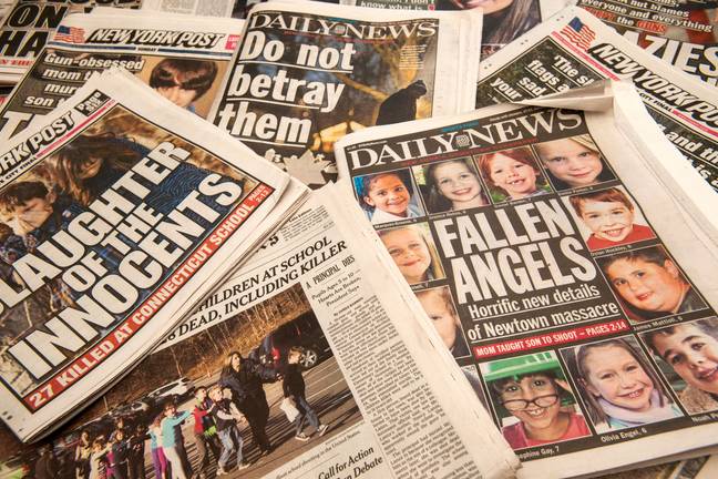 Front pages after Sandy Hook. Credit: Richard Levine / Alamy Stock Photo