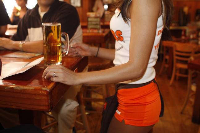 Hooters' waiting staff wear a very well-known uniform. Credit: Alamy