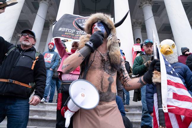 QAnon 'shaman' Jacob Chansley at the Capitol riots. Credit: ZUMA Press, Inc. / Alamy Stock Photo