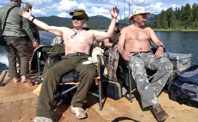 &quot;Hands up if you love being on holiday!&quot; - Putin, we assume. Credit: Kremlin Pool / Alamy Stock Photo